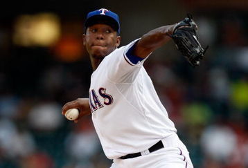 ARLINGTON, TX - SEPTEMBER 01:  Pitcher Neftali Feliz #30 of the Texas Rangers throws against the Toronto Blue Jays on September 1, 2009 at Rangers Ballpark in Arlington, Texas.  (Photo by Ronald Martinez/Getty Images)