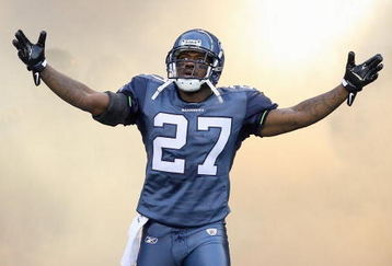 SEATTLE - AUGUST 22:  Jordan Babineaux #27 of the Seattle Seahawks celebrates as he enters the field before the game against the Denver Broncos on August 22, 2009 at Qwest Field in Seattle, Washington. (Photo by Otto Greule Jr/Getty Images)   