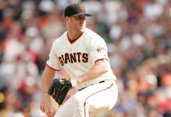 SAN FRANCISCO - AUGUST 30:  Brian Wilson #38 of the San Francisco Giants pitches against the Colorado Rockies at AT&T Park on August 30, 2009 in San Francisco, California.  (Photo by Ezra Shaw/Getty Images)