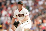 SAN FRANCISCO - AUGUST 30:  Brian Wilson #38 of the San Francisco Giants pitches against the Colorado Rockies at AT&T Park on August 30, 2009 in San Francisco, California.  (Photo by Ezra Shaw/Getty Images)
