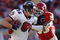 KANSAS CITY, MO - DECEMBER 10:  Derrick Johnson #56 of the Kansas City Chiefs attempts to tackle Todd Heap #86 of the Baltimore Ravens at Arrowhead Stadium December 10, 2006 in Kansas City, Missouri. The Ravens beat the Chiefs 20-10.  (Photo by Dilip Vishwanat/Getty Images)