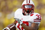 ANN ARBOR, MI - SEPTEMBER 27: John Clay #32 of the Wisconsin Badgers gets out into the open during a second quarter run against the Michigan Wolverines on September 27, 2008 at Michigan Stadium in Ann Arbor, Michigan. (Photo by Gregory Shamus/Getty Images)