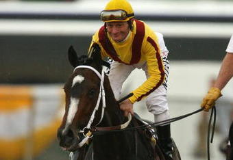 BALTIMORE - MAY 16:  Jockey Calvin Borel rides Rachel Alexandra to the winners circle after winning the 134th Running of the Preakness Stakes at Pimlico Race Course  on May 16, 2009 in Baltimore, Maryland.  (Photo by Al Bello/Getty Images)