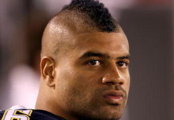 SAN DIEGO - SEPTEMBER 04:  Linebacker Shawne Merriman #56 of the San Diego Chargers sits on the bench during the game with the San Francisco 49ers on September 4, 2009 at Qualcomm Stadium in San Diego, California. The Chargers won 26-7. (Photo by Stephen Dunn/Getty Images)
