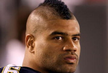 SAN DIEGO - SEPTEMBER 04:  Linebacker Shawne Merriman #56 of the San Diego Chargers sits on the bench during the game with the San Francisco 49ers on September 4, 2009 at Qualcomm Stadium in San Diego, California. The Chargers won 26-7. (Photo by Stephen Dunn/Getty Images)
