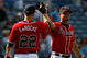 ATLANTA - AUGUST 23: Chipper Jones #10 and Adam LaRoche #22 of the Atlanta Braves celebrate their 7-5 win over the Florida Marlins on August 23, 2009 at Turner Field in Atlanta, Georgia. (Photo by Kevin C. Cox/Getty Images)