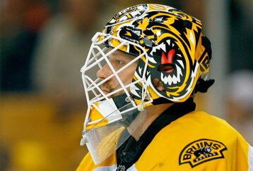BOSTON - MAY 10: Tim Thomas #30 of the Boston Bruins takes a break in the action against the Carolina Hurricances during Game Five of the Eastern Conference Semifinal Round of the 2009 Stanley Cup Playoffs on May 10, 2009 at the TD Banknorth Garden in Boston, Massachusetts. (Photo by Jim Rogash/Getty Images)