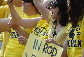 ANN ARBOR, MI - SEPTEMBER 05:  A fan in the student section holds up a sign supporting head coach Rich Rodriguez during a game between the Western Michigan Broncos and the Michigan Wolverines on September 5, 2009 at Michigan Stadium in Ann Arbor, Michigan. Michigan won the game 31-7.  (Photo by Gregory Shamus/Getty Images)