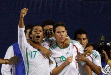CHICAGO - JULY 23:  (L-R) Giovani Dos Santos #17, Guillermo Franco #10 and Alberto Medina #7 of Mexico celebrate after Franco scored a goal in the second half against Costa Rica during their CONCACAF Cup Semifinal match at Soldier Field on July 23, 2009 in Chicago, Illinois.  (Photo by Brian Kersey/Getty Images)