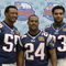 HOUSTON - JANUARY 27:  Pro Bowl selections defensive end Willie McGinest #55, cornerback Ty Law #24, defensive lineman Richard Seymour #93 of the New England Patriots pose for a photo on media day January 27, 2003 at Reliant Stadium before Super Bowl XXXVIII against the Carolina Panthers in Houston, Texas.  (Photo by Brian Bahr/Getty Images)
