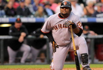 DENVER - JULY 25:  Pablo Sandoval #48 of the San Francisco Giants goes to his knees as he fouls off a pitch protecting a hit and run against the Colorado Rockies at Coors Field on July 25, 2009 in Denver, Colorado. The Rockies defeated the Giants 8-2.  (Photo by Doug Pensinger/Getty Images)