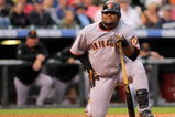 DENVER - JULY 25:  Pablo Sandoval #48 of the San Francisco Giants goes to his knees as he fouls off a pitch protecting a hit and run against the Colorado Rockies at Coors Field on July 25, 2009 in Denver, Colorado. The Rockies defeated the Giants 8-2.  (Photo by Doug Pensinger/Getty Images)