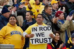 ANN ARBOR, MI - OCTOBER 25:  Fans of the Michigan Wolverines watch from the stands during the game against the Michigan State Spartans on October 25, 2008 at Michigan Stadium in Ann Arbor, Michigan. Michigan State won the game 35-21. (Photo by Gregory Shamus/Getty Images)