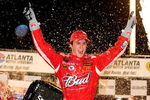 HAMPTON, GA - SEPTEMBER 06:  Kasey Kahne, driver of the #9 Budweiser Dodge celebrates in victory lane after winning the NASCAR Sprint Cup Series Pep Boys Auto 500 at Atlanta Motor Speedway on September 6, 2009 in Hampton, Georgia.  (Photo by Rusty Jarrett/Getty Images for NASCAR)