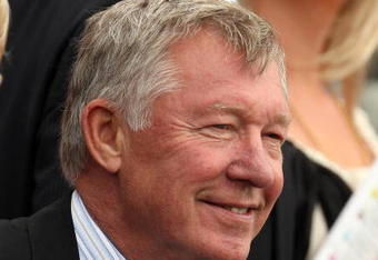 YORK, ENGLAND - AUGUST 20:  Manchester United manager, Sir Alex Ferguson, watches the second race at the Ebor Festival at York Race Course on August 20, 2009 in York, England.  (Photo by Ross Kinnaird/Getty Images)