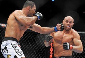 PORTLAND, OR - AUGUST 29:  UFC fighter Antonio Nogueira (L) battles UFC fighter Randy Couture (R) during their Heavyweight bout at UFC 102:  Couture vs. Nogueira at the Rose Garden Arena on August 29, 2009 in Portland, Oregon.  (Photo by Jon Kopaloff/Getty Images)
