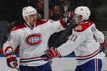 UNIONDALE, NY - APRIL 02: Andrei MArkov #79 (L) and Saku Koivu #11 (R) of the Montreal Canadiens celebrate a second period goal against the New York Islanders on April 2, 2009 at the Nassau Coliseum in Uniondale, New York. The Canadiens defeated the Islanders 5-1. (Photo by Bruce Bennett/Getty Images)