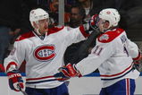 UNIONDALE, NY - APRIL 02: Andrei MArkov #79 (L) and Saku Koivu #11 (R) of the Montreal Canadiens celebrate a second period goal against the New York Islanders on April 2, 2009 at the Nassau Coliseum in Uniondale, New York. The Canadiens defeated the Islanders 5-1. (Photo by Bruce Bennett/Getty Images)