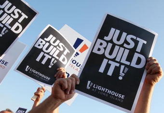 UNIONDALE, NY - AUGUST 04:  Members of Local 406 rally for support at the Nassau Coliseum prior to marching to the Lighthouse project public hearing at the Adams Playhouse on the campus of Hofstra University on August 4, 2009  in Uniondale, New York.  (Photo by Mike Stobe/Getty Images)