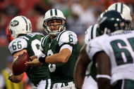 EAST RUTHERFORD, NJ - SEPTEMBER 3: Quarterback Mark Sanchez #6 of the New York Jets looks to make a pass play in the first quarter against the Philadelphia Eagles during the NFL preseason game at Giants Stadium on September 3, 2009 in East Rutherford, New Jersey. (Photo by Jim McIsaac/Getty Images)