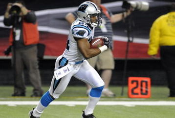 ATLANTA - NOVEMBER 23: Wide receiver Mark Jones #84 of the Carolina Panthers returns a kick against the Atlanta Falcons at the Georgia Dome on November 23, 2008 in Atlanta, Georgia.  (Photo by Al Messerschmidt/Getty Images) 