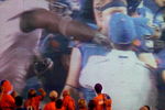 BOISE, ID - SEPTEMBER 3:  Boise State fans watch the video board as LaGarrette Blount #9 of the Oregon Ducks is shown punching a Boise State Broncos player after the game causing quite a commotion and talk of him being arrested on September 3, 2009 at Bronco Stadium in Boise, Idaho. Boise State defeated Oregon 19-8.(Photo by Steve Dykes/Getty Images)