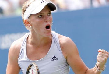 NEW YORK - SEPTEMBER 07:  Melanie Oudin of the United States celebrates after winning the second set in a tie break against Nadia Petrova of Russia during day eight of the 2009 U.S. Open at the USTA Billie Jean King National Tennis Center on September 7, 2009 in the Flushing neighborhood of the Queens borough of New York City.  (Photo by Matthew Stockman/Getty Images)