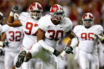 ATLANTA - SEPTEMBER 05:  Dont'a Hightower #30 of the Alabama Crimson Tide reacts after a defensive stop against the Virginia Tech Hokies during the Chick-fil-A Kickoff Game at Georgia Dome on September 5, 2009 in Atlanta, Georgia.  (Photo by Kevin C. Cox/Getty Images)
