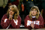 BLACKSBURG, VA - OCTOBER 25:  Two Virginia Tech Hokies' fans react after the Boston College Eagles scored the game-winning touchdown in the final seconds of the game at Lane Stadium October 25, 2007 in Blacksburg, Virginia.  Boston College defeated Virginia Tech 14-10.  (Photo by Kevin C. Cox/Getty Images)
