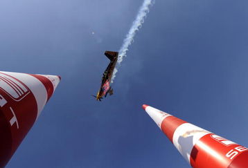 BUDAPEST, HUNGARY - AUGUST 19:  (EDITORIAL USE ONLY) In this handout image provided by Red Bull Air Race, American Pilot Kirby Chambliss flies through an Air Gate during the qualifying session of  the fourth round of the 2009 Red Bull Air Race World Championship on August 19, 2009 in Budapest, Hungary. (Photo by Tom Lovelock/Red Bull Air Race via Getty Images).