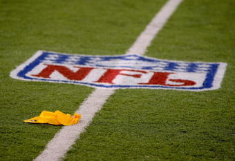 BALTIMORE - NOVEMBER 11:  A penalty flag is thrown as the Cincinnati Bengals face the Baltimore Ravens at M&T Bank Staduim on November 11, 2007 in Baltimore, Maryland. Cincinnati defeated Baltimore 21-7.  (Photo by Doug Pensinger/Getty Images)