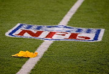 BALTIMORE - NOVEMBER 11:  A penalty flag is thrown as the Cincinnati Bengals face the Baltimore Ravens at M&T Bank Staduim on November 11, 2007 in Baltimore, Maryland. Cincinnati defeated Baltimore 21-7.  (Photo by Doug Pensinger/Getty Images)