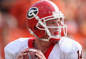 STILLWATER, OK - SEPTEMBER 05:  Quarterback Joe Cox #14 of the Georgia Bulldogs drops back to pass during the college football game against the Oklahoma State Cowboys at Boone Pickens Stadium on September 5, 2009 in Stillwater, Oklahoma.  The Cowboys defeated the Bulldogs 24-10.  (Photo by Christian Petersen/Getty Images)