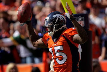 DENVER - SEPTEMBER 21:  Brandon Marshall #15 of the Denver Broncos celebrates his 35 yard first quarter touchdown reception against the New Orleans Saints during NFL action at Invesco Field at Mile High on September 21, 2008 in Denver, Colorado. The Broncos defeated the Saints 34-32.  (Photo by Doug Pensinger/Getty Images)