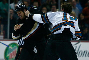 ANAHEIM, CA - APRIL 27:  (R-L) Center Joe Thornton #19 of the San Jose Sharks fights with center Ryan Getzlaf #15 of the Anaheim Ducks at the beginning of Game Six of the Western Conference Quarterfinal Round of the 2009 Stanley Cup Playoffs at the Honda Center on April 27, 2009 in Anaheim, California.  (Photo by Jeff Gross/Getty Images)