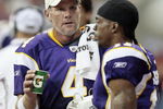 HOUSTON - AUGUST 31:  Quarterback Brett Favre #4 of the Minnesota Vikings talks with receiver Jaymar Johnson at Reliant Stadium on August 31, 2009 in Houston, Texas.  (Photo by Bob Levey/Getty Images)