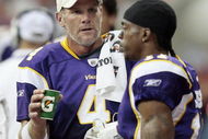 HOUSTON - AUGUST 31: Quarterback Brett Favre #4 of the Minnesota Vikings talks with receiver Jaymar Johnson at Reliant Stadium on August 31, 2009 in Houston, Texas. (Photo by Bob Levey/Getty Images)