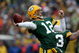 GREEN BAY, WI - NOVEMBER 30: Aaron Rodgers #12 of the Green Bay Packers throws a pass against the Carolina Panthers at Lambeau Field on November 30, 2008 in Green Bay, Wisconsin. The Panthers won 35-31. (Photo by Jonathan Daniel/Getty Images)