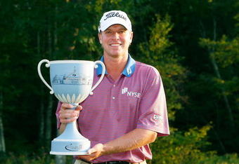NORTON, MA - SEPTEMBER 7:  Steve Stricker holds the champion's trophy after the final round of the Deutsche Bank Championship at TPC Boston on September 7, 2009 in Norton, Massachusetts. (Photo by Jim Rogash/Getty Images)