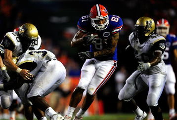 GAINESVILLE, FL - SEPTEMBER 05:  Aaron Hernandez #81 of the Florida Gators runs for yardage during the game against the Charleston Southern Buccaneers at Ben Hill Griffin Stadium on September 5, 2009 in Gainesville, Florida.  (Photo by Sam Greenwood/Getty Images)