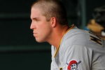 DENVER - AUGUST 13:  Pitcher Paul Maholm #28 of the Pittsburgh Pirates looks on from the dugout after he was taken out of the game in the seventh inning against the Colorado Rockies at Coors Field on August 13, 2009 in Denver, Colorado. (Photo by Doug Pensinger/Getty Images)