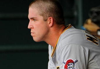 DENVER - AUGUST 13:  Pitcher Paul Maholm #28 of the Pittsburgh Pirates looks on from the dugout after he was taken out of the game in the seventh inning against the Colorado Rockies at Coors Field on August 13, 2009 in Denver, Colorado. (Photo by Doug Pensinger/Getty Images)