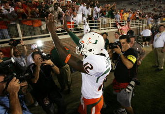 TALLAHASSEE, FL - SEPTEMBER 07:  Quarterback Jacory Harris #12 of the Miami Hurricanes celebrates victory over the Florida State Seminoles as he leaves the field at Doak Campbell Stadium on September 7, 2009 in Tallahassee, Florida. Miami defeated Florida State 38-34.  (Photo by Doug Benc/Getty Images)