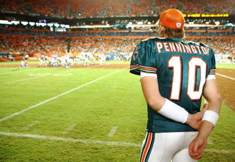 MIAMI - AUGUST 22:  Quarterback Chad Pennington #10 of the Miami Dolphins watches from the sidelines as his team takes on the Carolina Panthers during a pre-season game at Land Shark Stadium on August 22, 2009 in Miami, Florida. The Dolphins defeated the Panthers 27-17.  (Photo by Doug Benc/Getty Images)