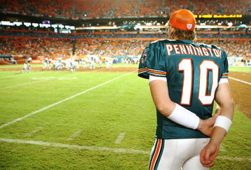 MIAMI - AUGUST 22:  Quarterback Chad Pennington #10 of the Miami Dolphins watches from the sidelines as his team takes on the Carolina Panthers during a pre-season game at Land Shark Stadium on August 22, 2009 in Miami, Florida. The Dolphins defeated the Panthers 27-17.  (Photo by Doug Benc/Getty Images)