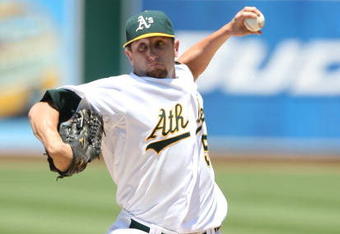 OAKLAND, CA - JULY 01: Dallas Braden #51 of the Oakland Athletics pitches against the Detroit Tigers during a Major League Baseball game on July 1, 2009 at the Oakland Coliseum in Oakland, California.  (Photo by Jed Jacobsohn/Getty Images)