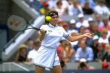 7 Sep 1997:  Martina Hingis of Switzerland plays a forehand return during the US Open at Flushing Meadow in New York, USA.  \ Mandatory Credit: Clive  Brunskill/Allsport