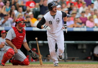 DENVER - SEPTEMBER 07:  Ian Stewart #9 of the Colorado Rockies leaves homeplate on his game winning solo homerun off of Carlos Fisher of the Cincinnati Reds in the eighth inning at Coors Field on September 7, 2009 in Denver, Colorado. The Rockies defeated the Reds 4-3.  (Photo by Doug Pensinger/Getty Images)