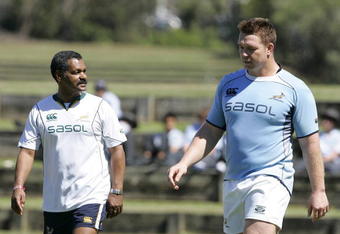 QUEENSLAND, AUSTRALIA - SEPTEMBER 08: Peter de Villiers and John Smit during the Springboks training session at Southport School on September 08, 2009 in Queensland, Australia. (Photo by Tertius Pickard/Gallo Images/Getty Images)