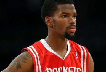 LOS ANGELES, CA - MAY 12:  Aaron Brooks #0 of the Houston Rockets looks on against the Los Angeles Lakers in Game Five of the Western Conference Semifinals during the 2009 NBA Playoffs at Staples Center on May 12, 2009 in Los Angeles, California. NOTE TO USER: User expressly acknowledges and agrees that, by downloading and or using this photograph, User is consenting to the terms and conditions of the Getty Images License Agreement.  (Photo by Stephen Dunn/Getty Images)